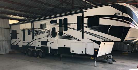 rv parked in rv or boat storage unit
