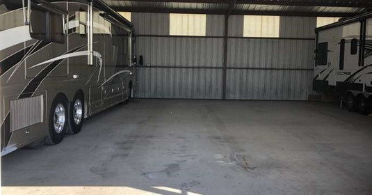 storage units, and RV parked in rv or boat storage unit